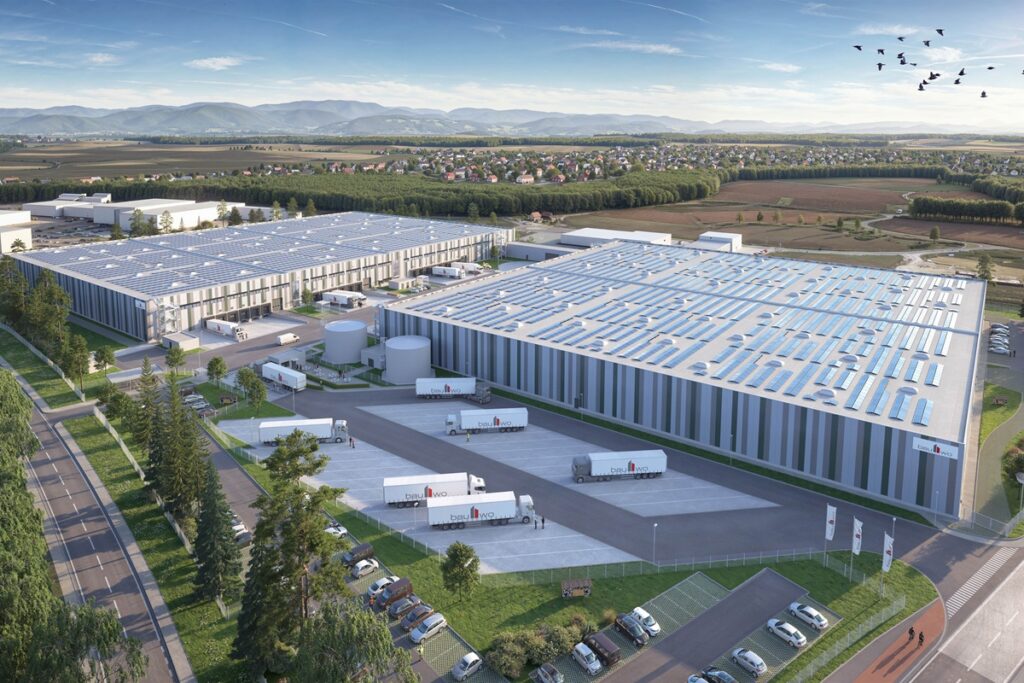 Visualisierung des geplanten Energieprojekts Rheinau: Auf dem Gewerbestandort entsteht eine Vier-Megawatt-Photovoltaikanlage, ergänzt um einen Batteriespeicher und Ladeinfrastruktur für elektrisch betriebene Lkw.