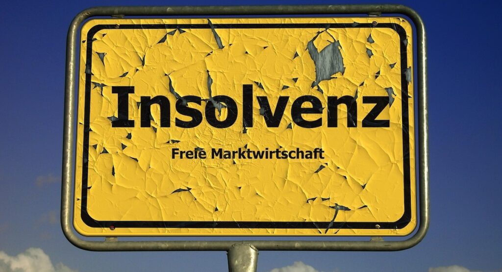 Ortsschild, Insolvenz, Symbolbild